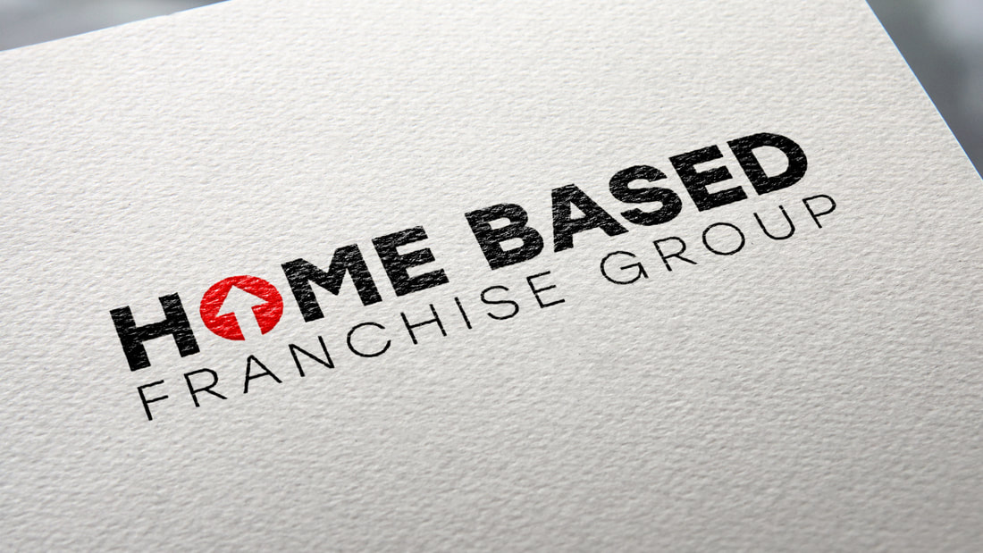 The Home Based Franchise Group logo portrayed on a white piece of paper